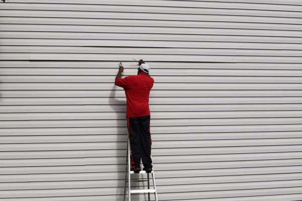 Loose Siding Repair in Leland