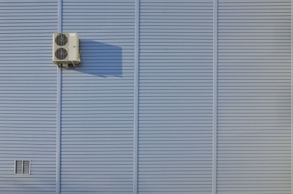 Flat Metal Siding Installation in Leland